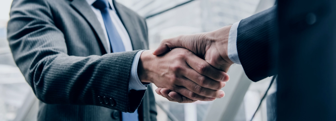 Persons shaking hands